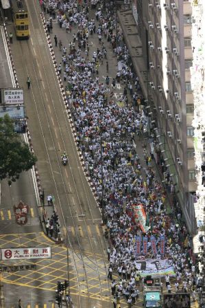 Thousands of protesters take to the streets in a protest march demanding universal suffrage in Hong Kong